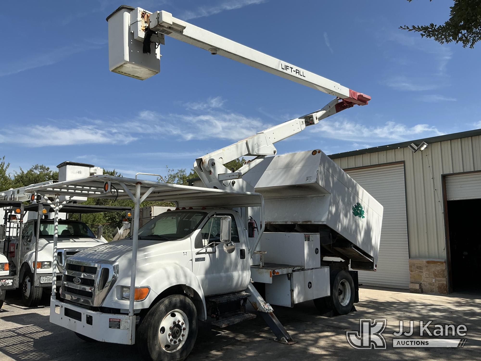 Lift-All LSS55-1S, Over-Center Bucket Truck mounted behind cab on 2007 Ford F-750 Chipper Dump Truck
