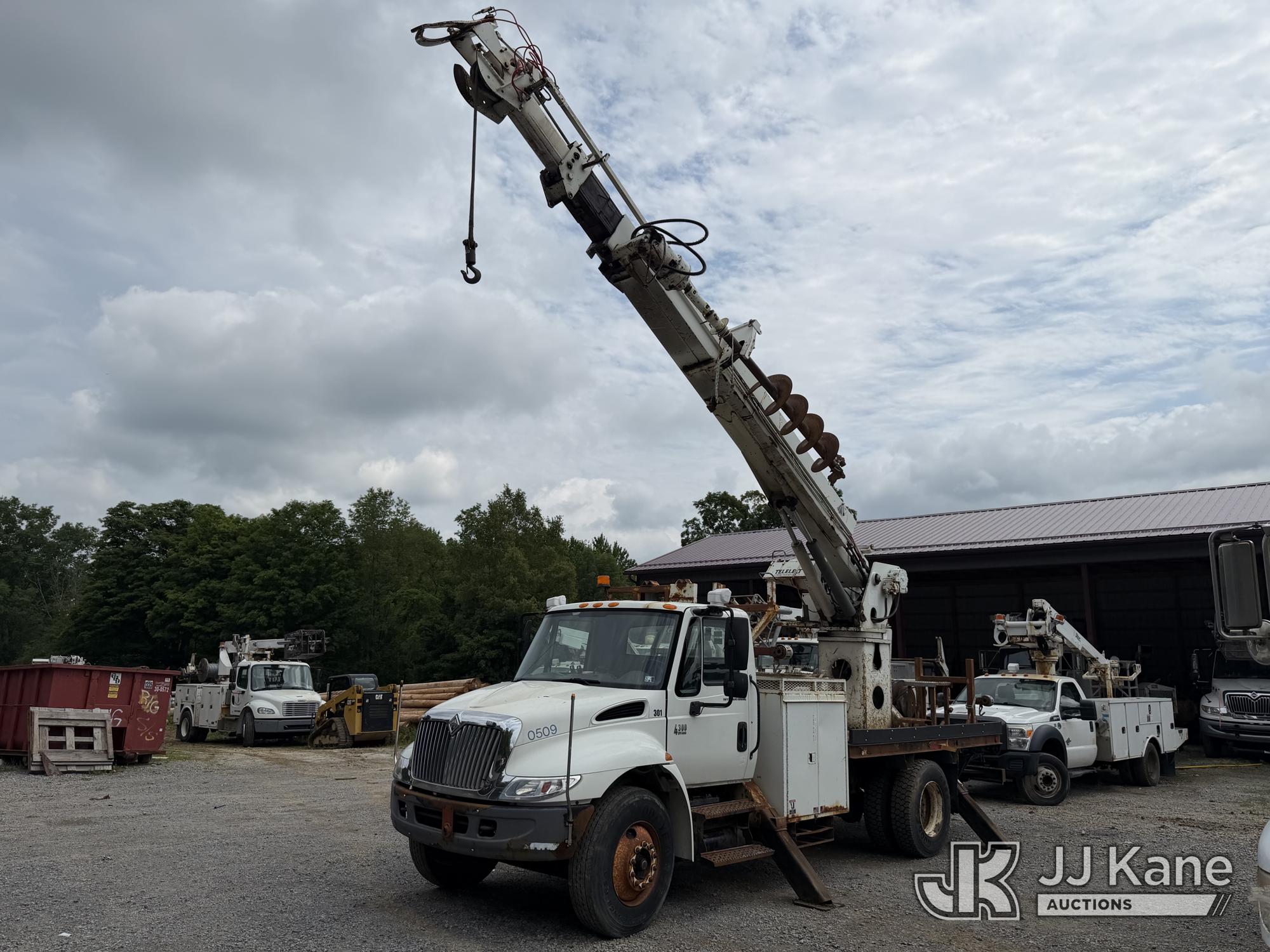 Telelect Commander 5048, Digger Derrick rear mounted on 2004 International 4300 Utility Truck