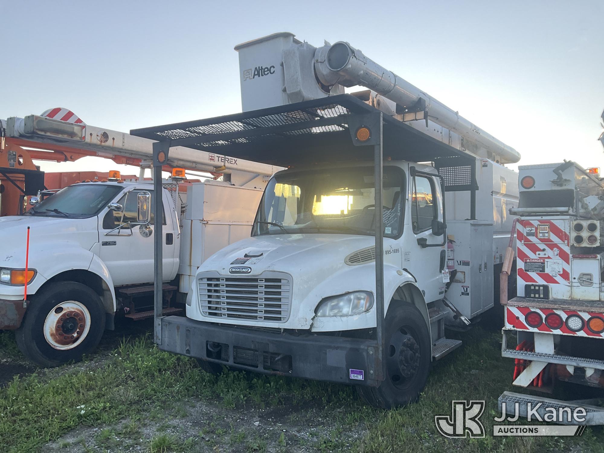 Altec LRV55, Over-Center Bucket Truck mounted behind cab on 2011 Freightliner M2 106 Chipper Dump Truck