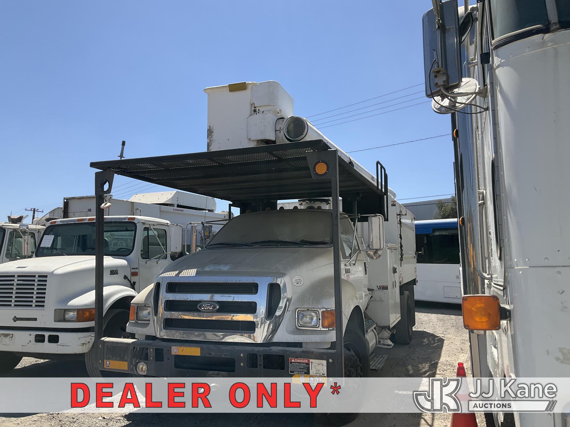 Altec LR756, Over-Center Bucket Truck mounted behind cab on 2013 Ford F-750 Regular Cab DRW Chipper Dump Truck