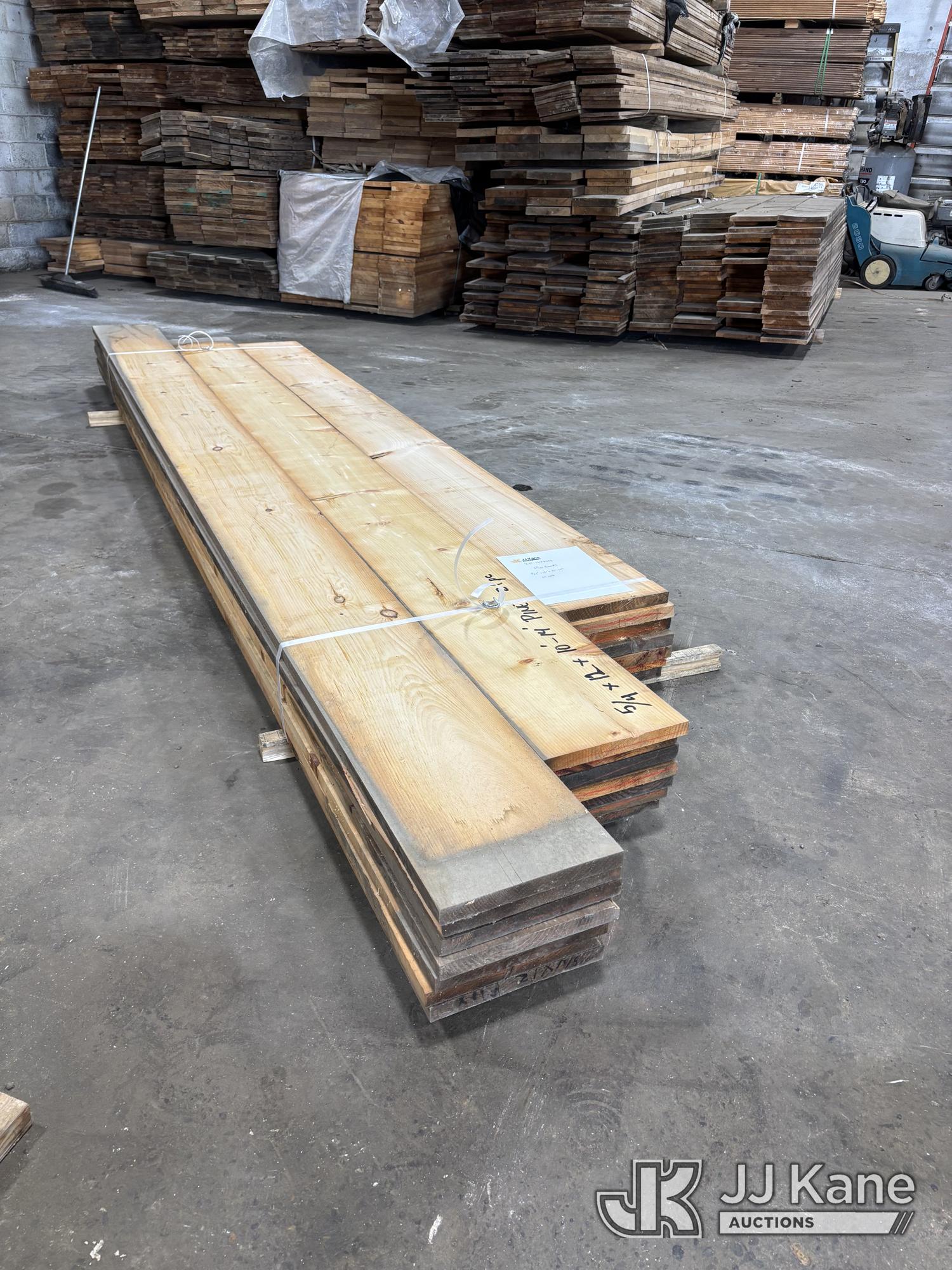 (21) Boards Pine Lumber 5/4 in. x 12 in. x 10 ft.-14 ft. NOTE: This unit is being sold AS IS/WHERE IS via Timed Auction and is located in Pilesgrove