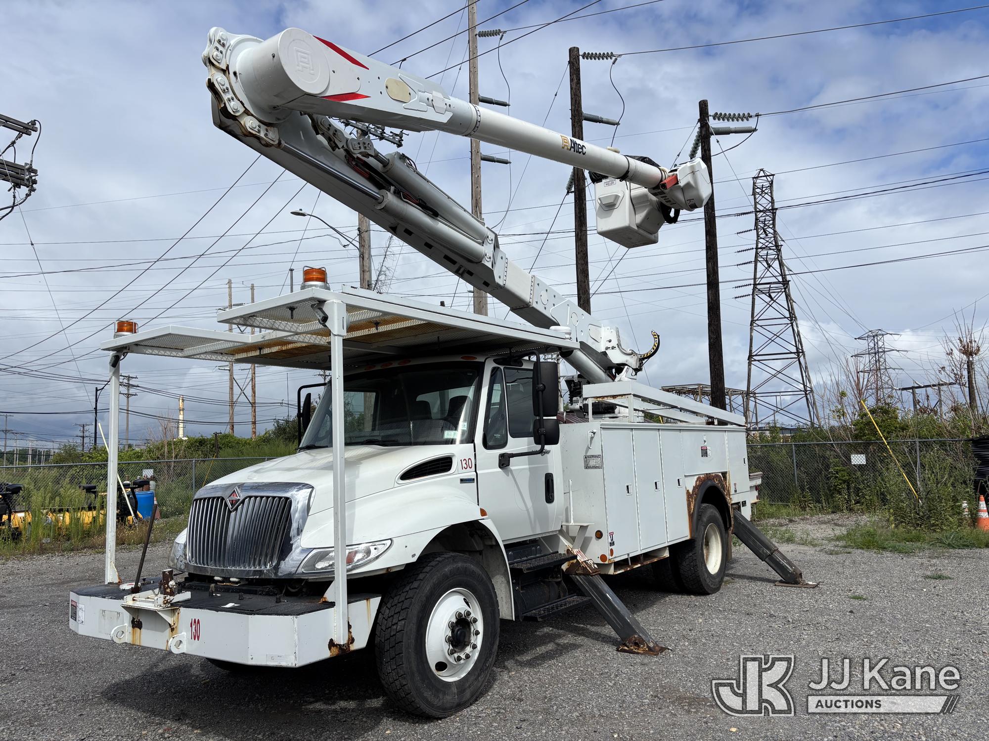 Altec AM55, Over-Center Material Handling Bucket Truck rear mounted on 2009 International 4300 Utility Truck